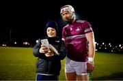 19 January 2022; Cian Lynch of NUIG poses for a selfie with a young fan after the Electric Ireland Higher Education GAA Fitzgibbon Cup Round 1 match between University College Dublin and National University of Ireland Galway at UCD Billings Park in Dublin. Photo by Stephen McCarthy/Sportsfile