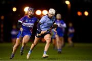 19 January 2022; Aoife Whelan of UCD in action against Clodagh Tynan of WIT during the Ashbourne Cup Round 2 match between University College Dublin and Waterford Institute of Technology at UCD in Dublin. Photo by Stephen McCarthy/Sportsfile