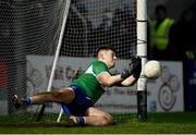 19 January 2022; Laois goalkeeper Matthew Byron saves the last penalty, taken by Paul Cribbin of Kildare, not pictured, during sudden death in the penalty shootout of the O'Byrne Cup Semi-Final match between Laois and Kildare at Netwatch Cullen Park in Carlow. Photo by Seb Daly/Sportsfile