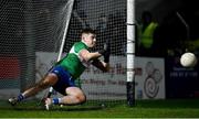 19 January 2022; Laois goalkeeper Matthew Byron saves the last penalty, taken by Paul Cribbin of Kildare, not pictured, during sudden death in the penalty shootout of the O'Byrne Cup Semi-Final match between Laois and Kildare at Netwatch Cullen Park in Carlow. Photo by Seb Daly/Sportsfile