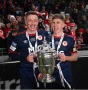 28 November 2021; Chris Forrester, left, and Jak Hickman of St Patrick's Athletic celebrate with the FAI Challenge Cup after their side's victory in the Extra.ie FAI Cup Final match between Bohemians and St Patrick's Athletic at Aviva Stadium in Dublin. Photo by Stephen McCarthy/Sportsfile