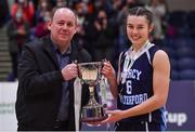 19 January 2022; Basketball Ireland president PJ Reidy presents the cup to Our Lady of Mercy captain Sarah Hickey after the Pinergy Basketball Ireland U19 A Girls Schools Cup Final match between Loreto Abbey Dalkey, Dublin, and Our Lady of Mercy, Waterford, at the National Basketball Arena in Dublin. Photo by Piaras Ó Mídheach/Sportsfile