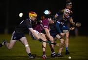 19 January 2022; Mark Gill of NUIG in action against Eoin Guilfoyle of UCD during the Electric Ireland Higher Education GAA Fitzgibbon Cup Round 1 match between University College Dublin and National University of Ireland Galway at UCD Billings Park in Dublin. Photo by Stephen McCarthy/Sportsfile