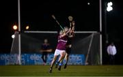 19 January 2022; Eoin Lawless of NUIG in action against Ciaran Foley of UCD during the Electric Ireland Higher Education GAA Fitzgibbon Cup Round 1 match between University College Dublin and National University of Ireland Galway at UCD Billings Park in Dublin. Photo by Stephen McCarthy/Sportsfile