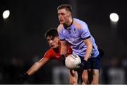19 January 2022; Kieran Kennedy of UCD in action against Colm O'Callaghan of UCC during the Electric Ireland Higher Education GAA Sigerson Cup Round 2 match between University College Dublin and University College Cork at UCD Billings Park in Dublin. Photo by Stephen McCarthy/Sportsfile