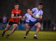 19 January 2022; Aaron McClements of UCD in action against Diarmuid O'Connor of UCC during the Electric Ireland Higher Education GAA Sigerson Cup Round 2 match between University College Dublin and University College Cork at UCD Billings Park in Dublin. Photo by Stephen McCarthy/Sportsfile