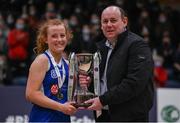 20 January 2022; Crescent Comprehensive captain Alli Walsh is presented the trophy by Basketball Ireland president PJ Reidy during the Pinergy Basketball Ireland U16 A Girls Schools Cup Final match between Colaiste Chiarain, Leixlip, Kildare and Crescent Comprehensive, Limerick, at the National Basketball Arena in Dublin. Photo by Harry Murphy/Sportsfile