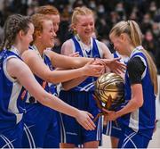 20 January 2022; An emotional MVP Ava Crean of Crescent Comprehensive is embraced by teammates after the Pinergy Basketball Ireland U16 A Girls Schools Cup Final match between Colaiste Chiarain, Leixlip, Kildare and Crescent Comprehensive, Limerick, at the National Basketball Arena in Dublin. Photo by Harry Murphy/Sportsfile