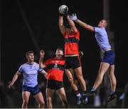19 January 2022; Colm O'Callaghan of UCC in action against Peadar Ó Cofaigh Byrne of UCD during the Electric Ireland Higher Education GAA Sigerson Cup Round 2 match between University College Dublin and University College Cork at UCD Billings Park in Dublin. Photo by Stephen McCarthy/Sportsfile