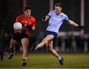19 January 2022; Kieran Kennedy of UCD in action against Colm O'Callaghan of UCC during the Electric Ireland Higher Education GAA Sigerson Cup Round 2 match between University College Dublin and University College Cork at UCD Billings Park in Dublin. Photo by Stephen McCarthy/Sportsfile