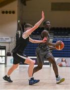 20 January 2022; Denis Mathews of Crescent Comprehensive in action against Darragh McGovern of St Louis during the Pinergy Basketball Ireland U16 B Boys Schools Cup Final match between St Louis CS, Kiltimagh, Mayo and Crescent Comprehensive, Limerick, at the National Basketball Arena in Dublin. Photo by Harry Murphy/Sportsfile