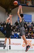 20 January 2022; Max Bennett of St Louis takes a shot under pressure from Con Kirby of Crescent Comprehensive during the Pinergy Basketball Ireland U16 B Boys Schools Cup Final match between St Louis CS, Kiltimagh, Mayo and Crescent Comprehensive, Limerick, at the National Basketball Arena in Dublin. Photo by Harry Murphy/Sportsfile