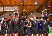 20 January 2022; Crescent Comprehensive players celebrate with the trophy after their side's victory in the Pinergy Basketball Ireland U16 B Boys Schools Cup Final match between St Louis CS, Kiltimagh, Mayo and Crescent Comprehensive, Limerick, at the National Basketball Arena in Dublin. Photo by Harry Murphy/Sportsfile