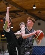 20 January 2022; Sean Morrissey of Crescent Comprehensive in action against Oisin Mulderrig of St Louis during the Pinergy Basketball Ireland U16 B Boys Schools Cup Final match between St Louis CS, Kiltimagh, Mayo and Crescent Comprehensive, Limerick, at the National Basketball Arena in Dublin. Photo by Harry Murphy/Sportsfile