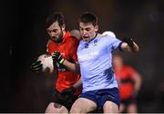 19 January 2022; Ruari McCormack of UCD in action against Daniel O'Brien of UCC during the Electric Ireland Higher Education GAA Sigerson Cup Round 2 match between University College Dublin and University College Cork at UCD Billings Park in Dublin. Photo by Stephen McCarthy/Sportsfile