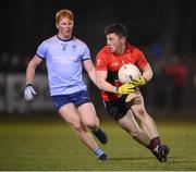 19 January 2022; Mark Cronin of UCC in action against Ryan O'Toole of UCD during the Electric Ireland Higher Education GAA Sigerson Cup Round 2 match between University College Dublin and University College Cork at UCD Billings Park in Dublin. Photo by Stephen McCarthy/Sportsfile