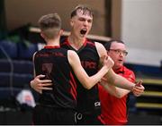 20 January 2022; Aivaras Uosis of Pobailscoil Chorca Dhuibhne, centre, celebrates a three pointer on the buzzer with teammate Kiernan Ó Moráin during the Pinergy Basketball Ireland U19 C Boys Schools Cup Final match between Gaelcholaiste Cheatharlach, Carlow, and Pobailscoil Chorca Dhuibhne, Dingle, Kerry, at the National Basketball Arena in Dublin. Photo by Harry Murphy/Sportsfile