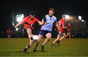 19 January 2022; Dylan Geaney of UCC in action against Ryan O'Toole of UCD during the Electric Ireland Higher Education GAA Sigerson Cup Round 2 match between University College Dublin and University College Cork at UCD Billings Park in Dublin. Photo by Stephen McCarthy/Sportsfile