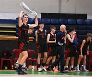 20 January 2022; Aivaras Uosis of Pobailscoil Chorca Dhuibhne celebrates during the Pinergy Basketball Ireland U19 C Boys Schools Cup Final match between Gaelcholaiste Cheatharlach, Carlow, and Pobailscoil Chorca Dhuibhne, Dingle, Kerry, at the National Basketball Arena in Dublin. Photo by Harry Murphy/Sportsfile