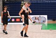 20 January 2022; Aivaras Uosis, front, and Patrick Mac Sandair of Pobailscoil Chorca Dhuibhne celebrate after their side's victory in the Pinergy Basketball Ireland U19 C Boys Schools Cup Final match between Gaelcholaiste Cheatharlach, Carlow, and Pobailscoil Chorca Dhuibhne, Dingle, Kerry, at the National Basketball Arena in Dublin. Photo by Harry Murphy/Sportsfile