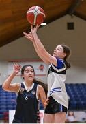20 January 2022; Catherine McCreanor of OLSPCK takes a shot under pressure from Amy Kellaghan of Colaiste Muire Crosshaven during the Pinergy Basketball Ireland U16 B Girls Schools Cup Final match between OLSPCK, Belfast, and Colaiste Muire Crosshaven, Cork, at the National Basketball Arena in Dublin. Photo by Harry Murphy/Sportsfile
