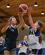 20 January 2022; Alex Fegan of Colaiste Muire Crosshaven in action against Ellie Sargeant of OLSPCK during the Pinergy Basketball Ireland U16 B Girls Schools Cup Final match between OLSPCK, Belfast, and Colaiste Muire Crosshaven, Cork, at the National Basketball Arena in Dublin. Photo by Harry Murphy/Sportsfile