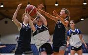 20 January 2022; Catherine McCreanor of OLSPCK in action against Katie Foley, left, and Alex Fegan of Colaiste Muire Crosshaven during the Pinergy Basketball Ireland U16 B Girls Schools Cup Final match between OLSPCK, Belfast, and Colaiste Muire Crosshaven, Cork, at the National Basketball Arena in Dublin. Photo by Harry Murphy/Sportsfile