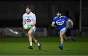 19 January 2022; Kevin O’Callaghan of Kildare in action against Daniel O’Reilly of Laois during the O'Byrne Cup Semi-Final match between Laois and Kildare at Netwatch Cullen Park in Carlow. Photo by Seb Daly/Sportsfile