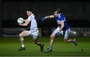 19 January 2022; Kevin Flynn of Kildare in action against Kieran Lillis of Laois during the O'Byrne Cup Semi-Final match between Laois and Kildare at Netwatch Cullen Park in Carlow. Photo by Seb Daly/Sportsfile