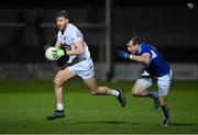 19 January 2022; Kevin O’Callaghan of Kildare in action against Kieran Lillis of Laois during the O'Byrne Cup Semi-Final match between Laois and Kildare at Netwatch Cullen Park in Carlow. Photo by Seb Daly/Sportsfile
