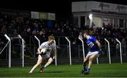 19 January 2022; Daniel Flynn of Kildare in action against Trevor Collins of Laois during the O'Byrne Cup Semi-Final match between Laois and Kildare at Netwatch Cullen Park in Carlow. Photo by Seb Daly/Sportsfile
