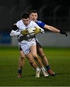 19 January 2022; Eoghan Lawless of Kildare in action against John O’Loughlin of Laois during the O'Byrne Cup Semi-Final match between Laois and Kildare at Netwatch Cullen Park in Carlow. Photo by Seb Daly/Sportsfile