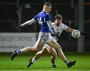19 January 2022; Evan O’Carroll of Laois in action against Mike Joyce of Kildare during the O'Byrne Cup Semi-Final match between Laois and Kildare at Netwatch Cullen Park in Carlow. Photo by Seb Daly/Sportsfile Photo by Seb Daly/Sportsfile