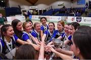20 January 2022; OLSPCK players celebrate with the trophy after their side's victory in the Pinergy Basketball Ireland U16 B Girls Schools Cup Final match between OLSPCK, Belfast, and Colaiste Muire Crosshaven, Cork, at the National Basketball Arena in Dublin. Photo by Harry Murphy/Sportsfile