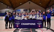 20 January 2022; OLSPCK players celebrate with the trophy after their side's victory in the Pinergy Basketball Ireland U16 B Girls Schools Cup Final match between OLSPCK, Belfast, and Colaiste Muire Crosshaven, Cork, at the National Basketball Arena in Dublin. Photo by Harry Murphy/Sportsfile