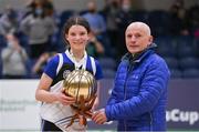 20 January 2022; Eimear Napier of OLSPCK is presented the MVP trophy by Ger Tarrant after the Pinergy Basketball Ireland U16 B Girls Schools Cup Final match between OLSPCK, Belfast, and Colaiste Muire Crosshaven, Cork, at the National Basketball Arena in Dublin. Photo by Harry Murphy/Sportsfile