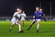 19 January 2022; Paddy Woodgate of Kildare in action against Alex Mohan of Laois during the O'Byrne Cup Semi-Final match between Laois and Kildare at Netwatch Cullen Park in Carlow. Photo by Seb Daly/Sportsfile