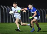 19 January 2022; Jack Sargent of Kildare in action against Patrick O’Sullivan of Laois during the O'Byrne Cup Semi-Final match between Laois and Kildare at Netwatch Cullen Park in Carlow. Photo by Seb Daly/Sportsfile