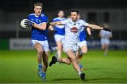 19 January 2022; Sean O’Flynn of Laois in action against Davy O’Neill of Kildare during the O'Byrne Cup Semi-Final match between Laois and Kildare at Netwatch Cullen Park in Carlow. Photo by Seb Daly/Sportsfile