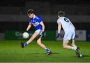 19 January 2022; Brian Byrne of Laois in action against James Murray of Kildare during the O'Byrne Cup Semi-Final match between Laois and Kildare at Netwatch Cullen Park in Carlow. Photo by Seb Daly/Sportsfile