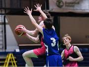 19 January 2022; Liam Price of St Munchin's College in action against Maitiú Heckmann of Blackrock College during the Pinergy Basketball Ireland U19 B Boys Schools Cup Final match between Blackrock College, Dublin, and St Munchin’s College, Limerick, at the National Basketball Arena in Dublin. Photo by Piaras Ó Mídheach/Sportsfile