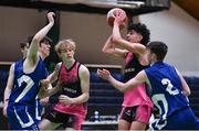 19 January 2022; Patryk Rejkowicz of St Munchin's College shoots under pressure from Hugo Kelly of Blackrock College, 2, during the Pinergy Basketball Ireland U19 B Boys Schools Cup Final match between Blackrock College, Dublin, and St Munchin’s College, Limerick, at the National Basketball Arena in Dublin. Photo by Piaras Ó Mídheach/Sportsfile