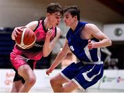 19 January 2022; Liam Price of St Munchin's College in action against Ronin O’Hallorin of Blackrock College during the Pinergy Basketball Ireland U19 B Boys Schools Cup Final match between Blackrock College, Dublin, and St Munchin’s College, Limerick, at the National Basketball Arena in Dublin. Photo by Piaras Ó Mídheach/Sportsfile