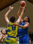 21 January 2022; Jordan Ukah of UCC Demons in action against Colm O'Reilly of UCD Marian during the InsureMyHouse.ie U20 Men's National Cup Final match between UCC Blue Demons, Cork and UCD Marian, Dublin at the National Basketball Arena in Tallaght, Dublin. Photo by Brendan Moran/Sportsfile
