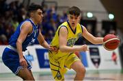 21 January 2022; Paraic Moran of UCD Marian in action against Daryl Cuff of UCC Demons during the InsureMyHouse.ie U20 Men's National Cup Final match between UCC Blue Demons, Cork and UCD Marian, Dublin at the National Basketball Arena in Tallaght, Dublin. Photo by Brendan Moran/Sportsfile