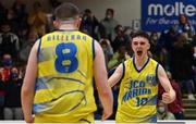 21 January 2022; Ronan Byrne, right, and teammate Luke Gilleran of UCD Marian celebrate at the final buzzer of the InsureMyHouse.ie U20 Men's National Cup Final match between UCC Blue Demons, Cork and UCD Marian, Dublin at the National Basketball Arena in Tallaght, Dublin. Photo by Brendan Moran/Sportsfile