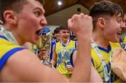 21 January 2022; UCD Marian players, from left, Ronan Byrne, Paraic Moran and Brian O'Hara Duggan celebrate after the InsureMyHouse.ie U20 Men's National Cup Final match between UCC Blue Demons, Cork and UCD Marian, Dublin at the National Basketball Arena in Tallaght, Dublin. Photo by Brendan Moran/Sportsfile