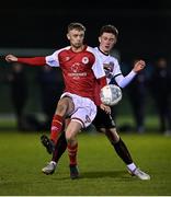 21 January 2022; Reece Webb of St Patrick's Athletic in action against Jamie Mullins of Bohemians during the pre-season friendly match between Bohemians and St Patrick's Athletic at the FAI National Training Centre in Abbotstown, Dublin. Photo by Piaras Ó Mídheach/Sportsfile