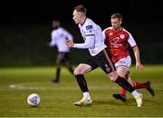 21 January 2022; Ciarán Kelly of Bohemians in action against Eoin Doyle of St Patrick's Athletic during the pre-season friendly match between Bohemians and St Patrick's Athletic at the FAI National Training Centre in Abbotstown, Dublin. Photo by Piaras Ó Mídheach/Sportsfile