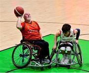 22 January 2022; Mick Cunningham of Killester in action against Conor Coughlan of Rebel Wheelers during the InsureMyHouse.ie IWA Cup final match between Killester BC, Dublin, and Rebel Wheelers, Cork, at National Basketball Arena in Tallaght, Dublin. Photo by Brendan Moran/Sportsfile
